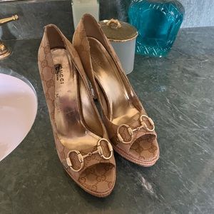 Gucci heels with buckle.